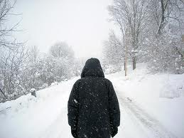 man_walking_in_snow