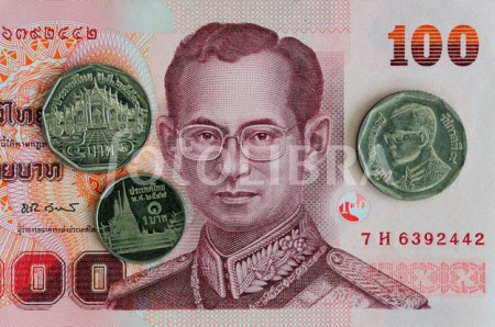 100 Thai Baht Banknote and coins